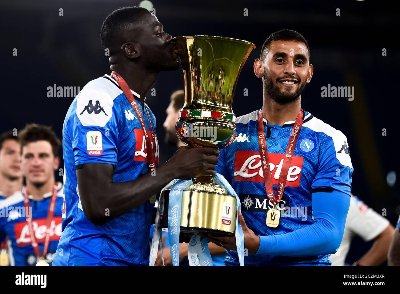 Rome, Italy. 17th June, 2020. ROME, ITALY - June 17, 2020: Kalidou Koulibaly of SSC Napoli and Faouzi Ghoulam of SSC Napoli celebrate with the trophy during the Coppa Italia final football match between SSC Napoli and Juventus FC. (Photo by Nicolò Campo/Sipa USA) Credit: Sipa USA/Alamy Live News Stock Photo