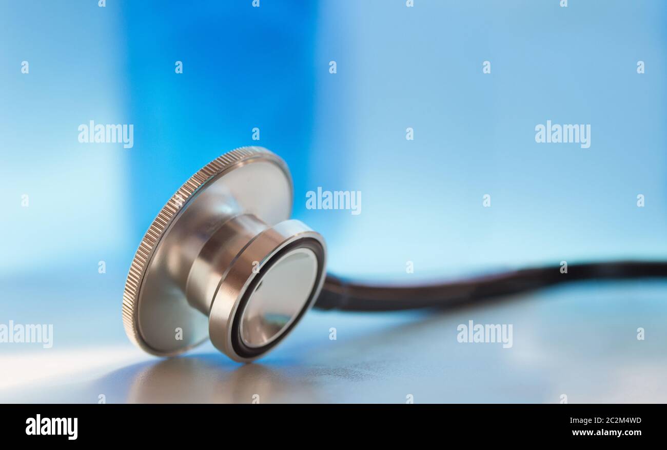 Stethoscope closeup blue background for medical doctor with copyspace, high resolution wide medicine concept Stock Photo