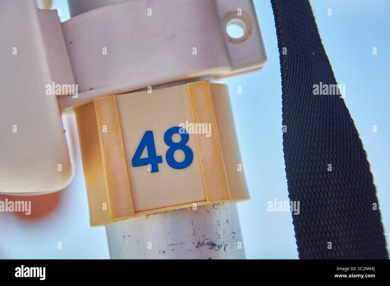 Numbered ferry with the number 48 used to mark the number of beach umbrellas in the bathhouse. Stock Photo