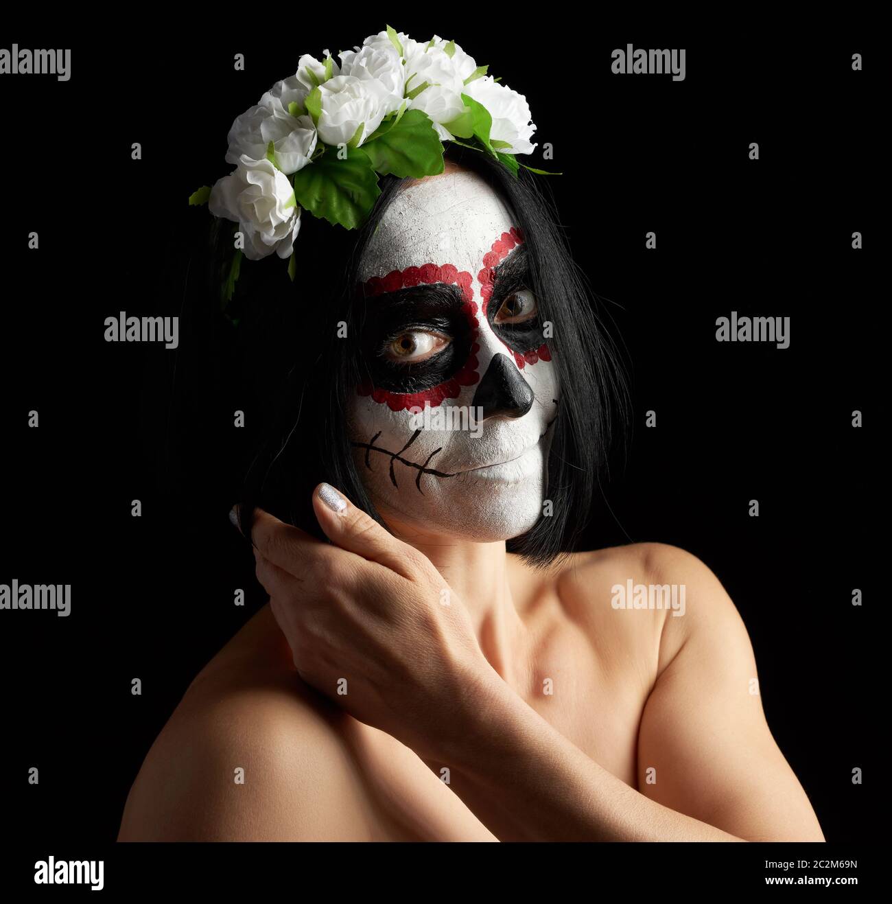 Young beautiful girl with traditional mexican death mask. Calavera Catrina.  Sugar skull makeup. girl dressed in a wreath of white roses Stock Photo -  Alamy