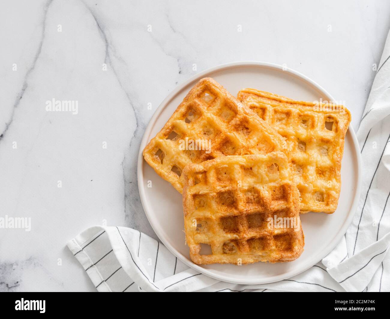 Savory keto two ingredients waffles chaffles Stock Photo Alamy