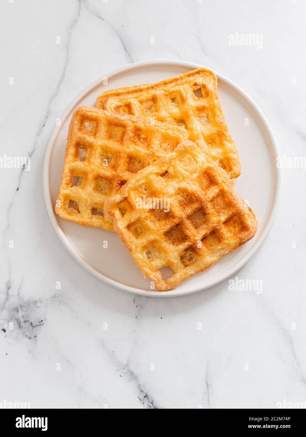 Savory keto two ingredients waffles chaffles Stock Photo Alamy