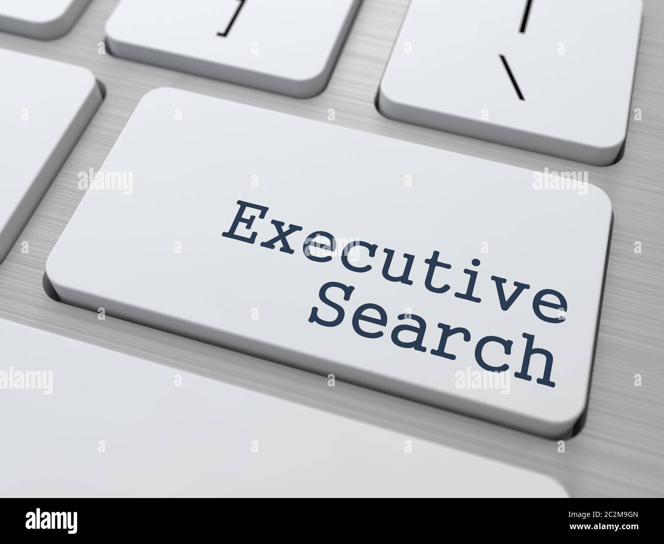 White Button with Executive Search on Computer Keyboard. Business Concept. Stock Photo