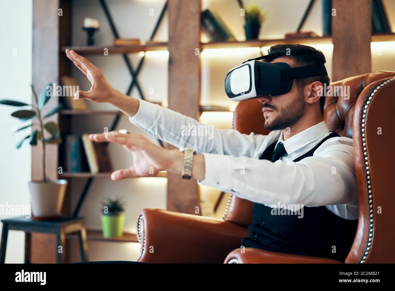 Man wearing virtual reality goggles Stock Photo