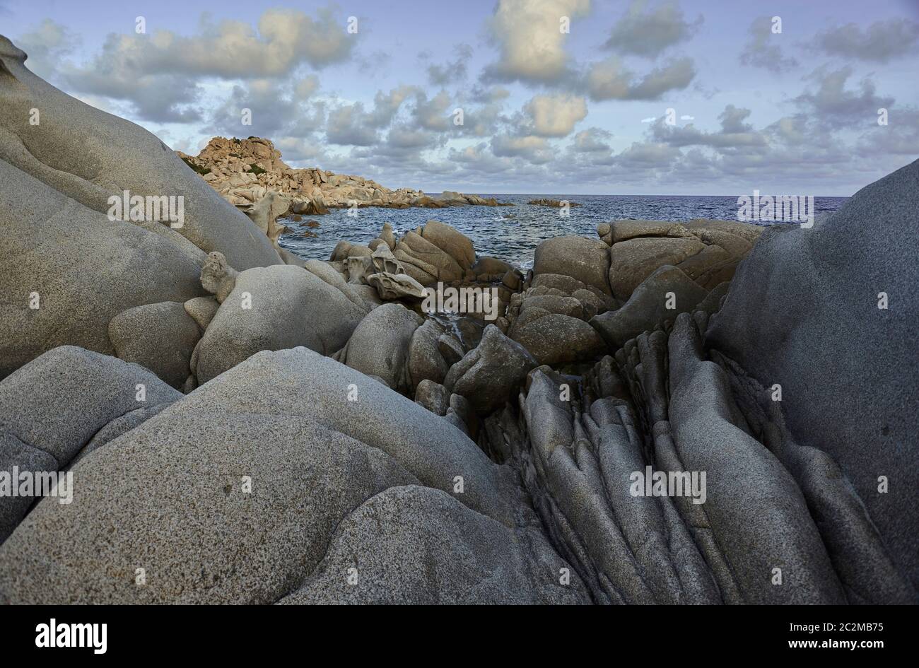 Detail of the southern coastline of Sardinia, precisely in the locality of Punta Molentis: a coastline with particular shapes given by the granite roc Stock Photo
