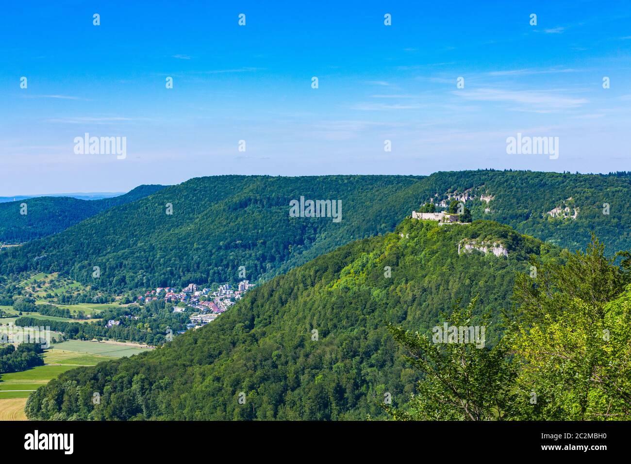 view  to Bad Urach and castle at the Swabian Alb in Germany Stock Photo