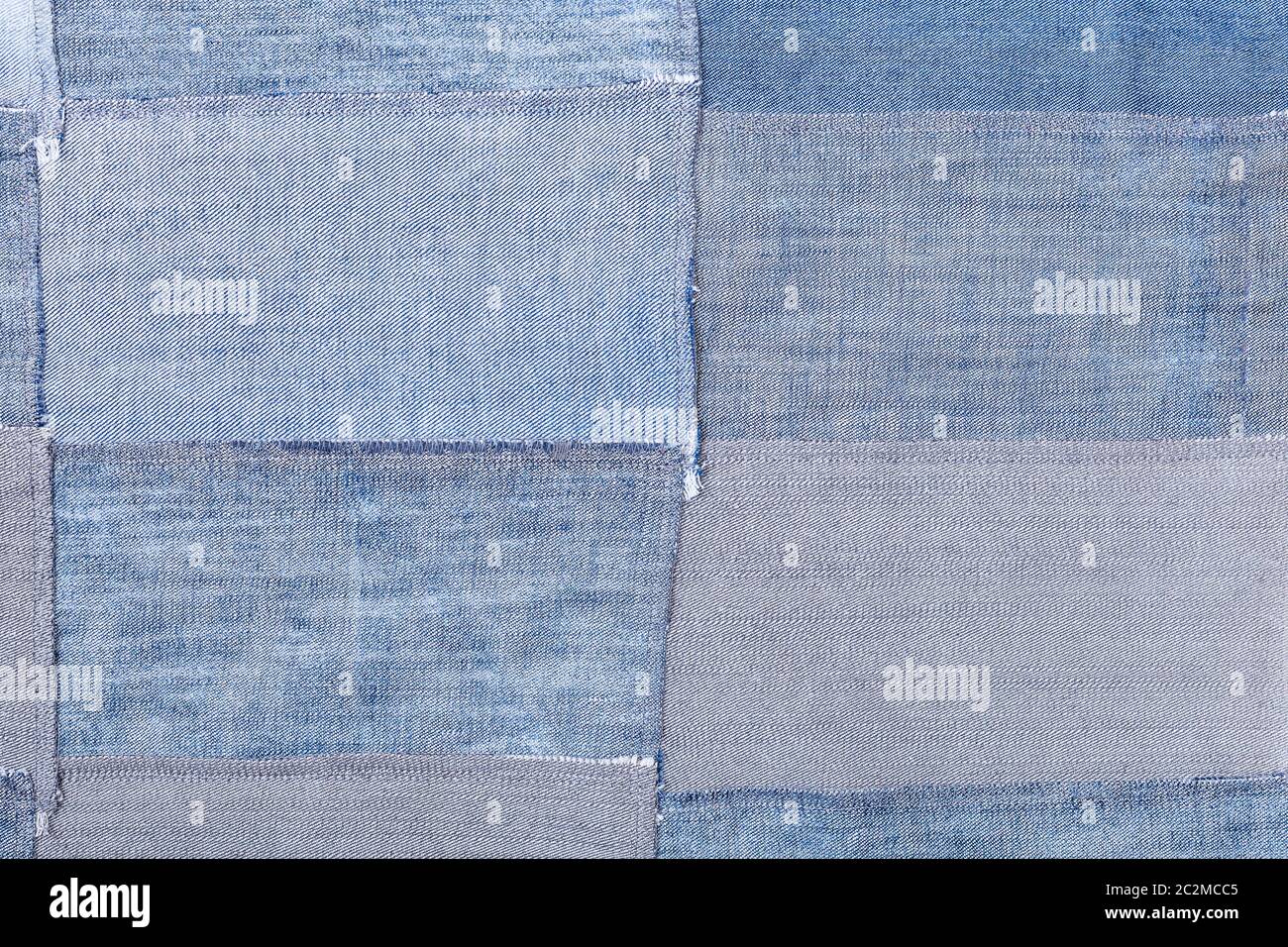 textile background - patchwork from denim flaps Stock Photo