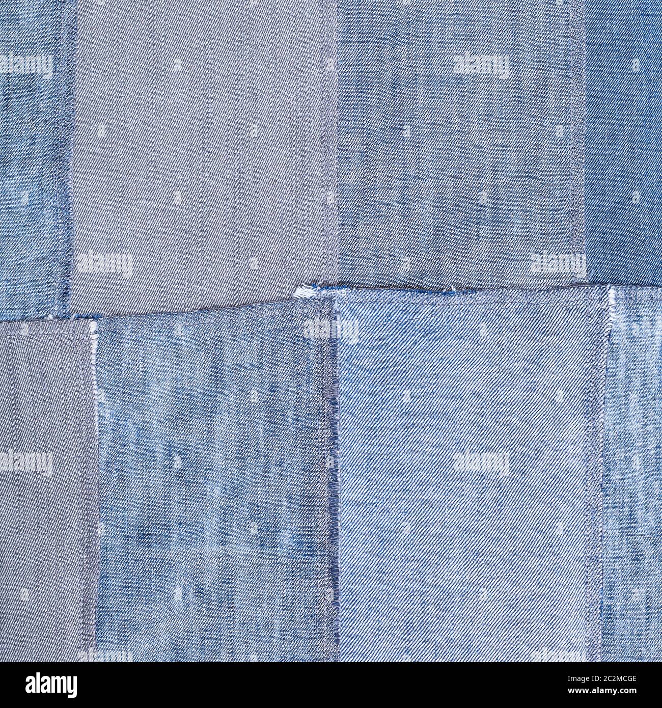 textile square background - patchwork from old denim flaps Stock Photo