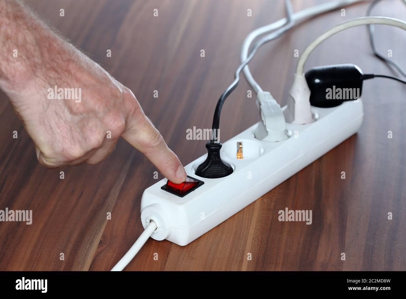 shut down a device with switch, save energy Stock Photo