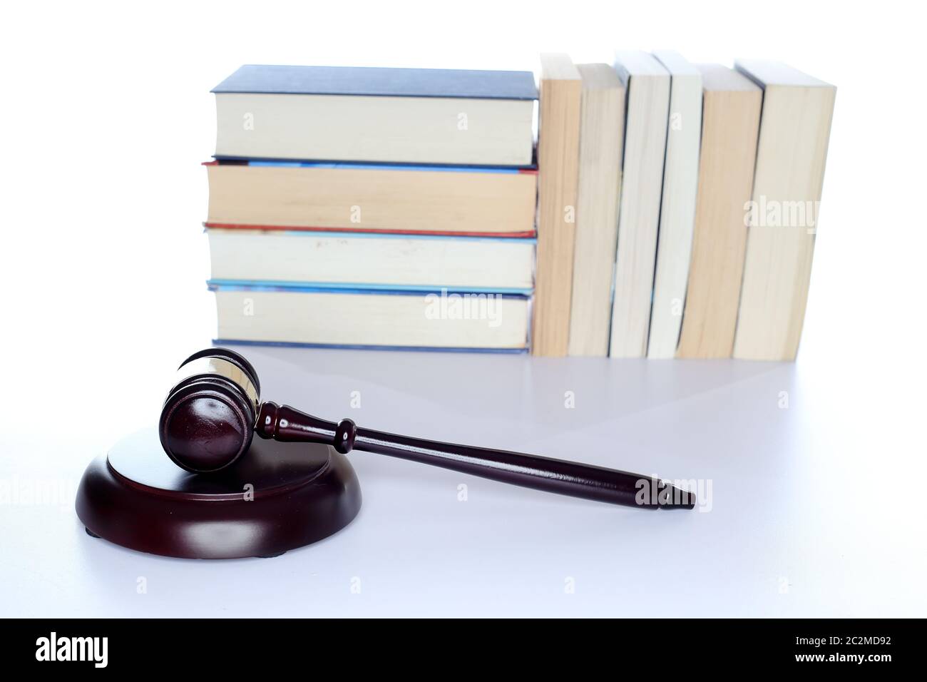 symbolic gavel and law book isolated on background Stock Photo