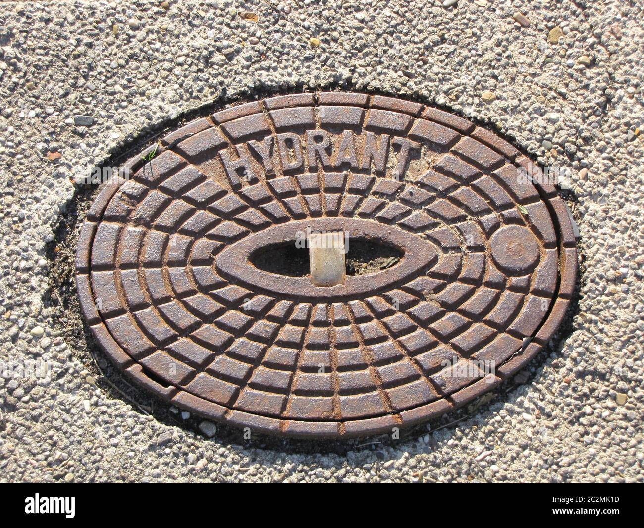 Hydrant for water to extinguish fire placed under the surface of a street Stock Photo