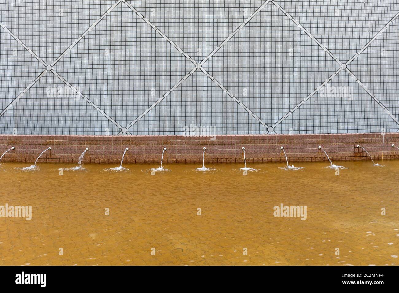 Yellow Water Fountain Pond in Hong Kong Stock Photo Alamy