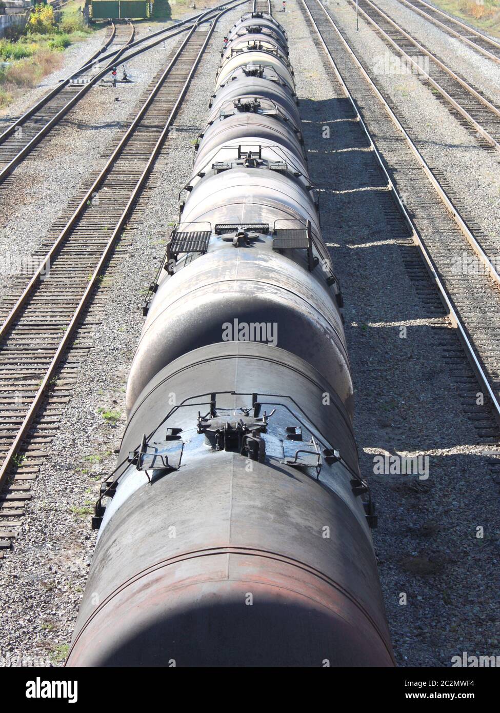 The train transports oil in tanks . Stock Photo
