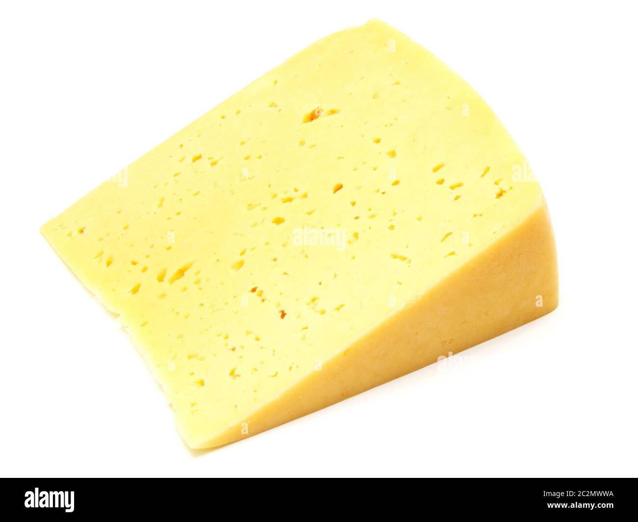 A piece of Swiss cheese Stock Photo