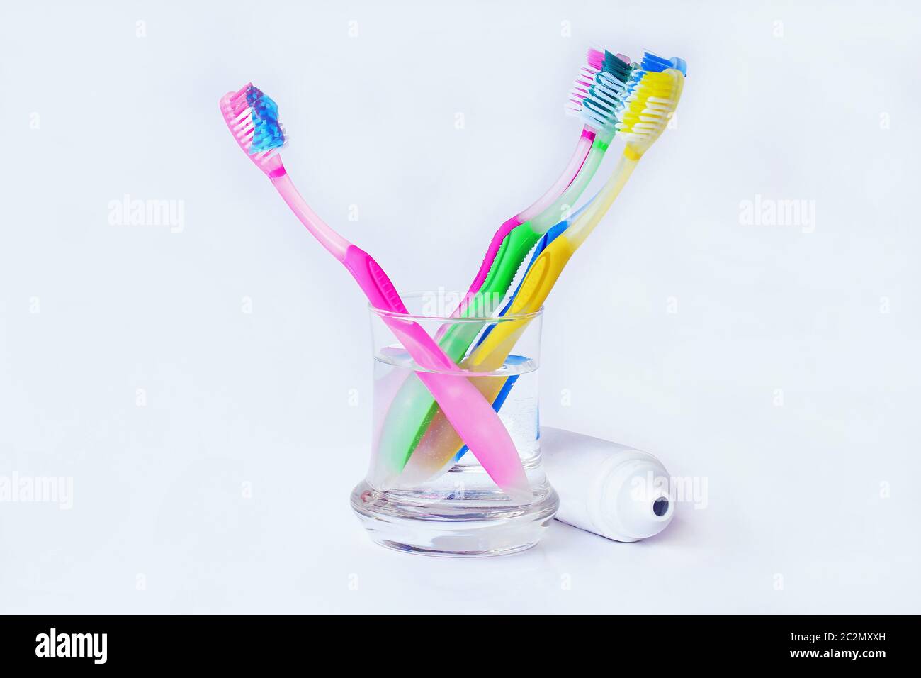 Healthy, well-kept teeth by brushing with toothbrushes and toothpaste Stock Photo