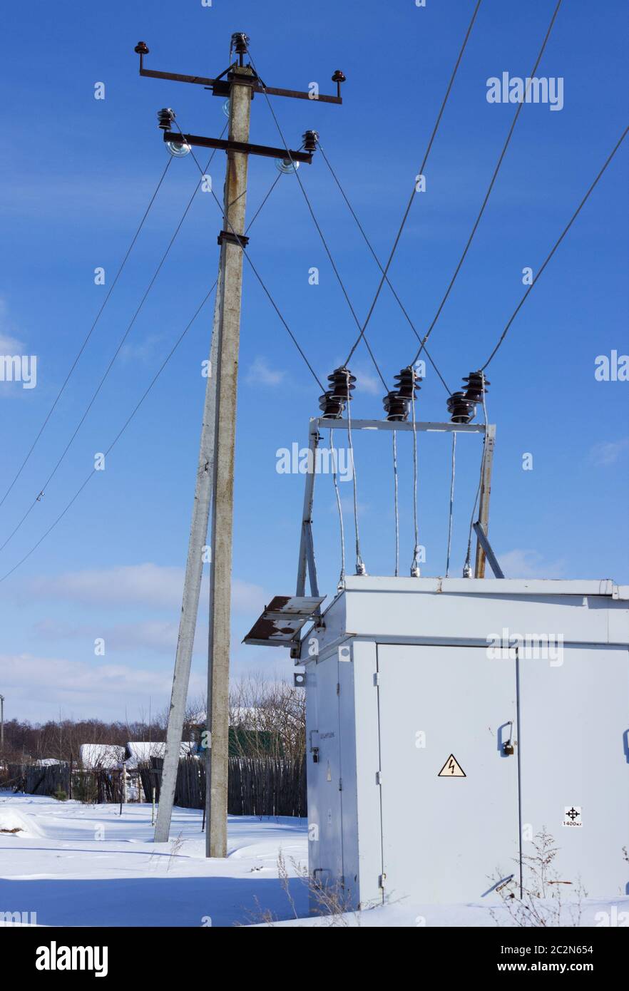 Electric substation on the edge of the village Stock Photo