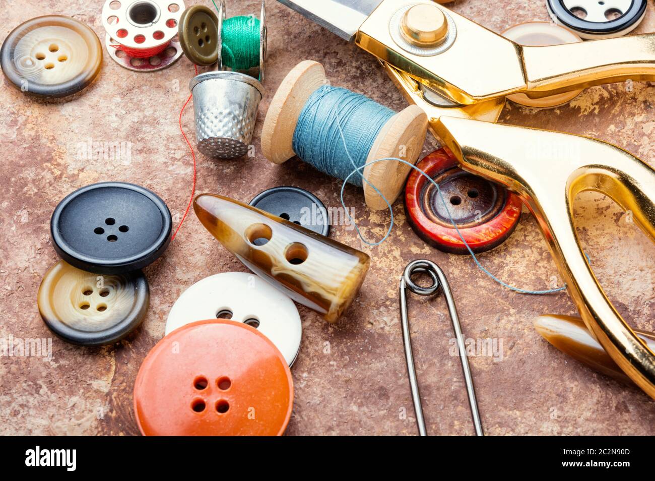 Sewing tools, scissors, many buttons and threads Stock Photo Alamy