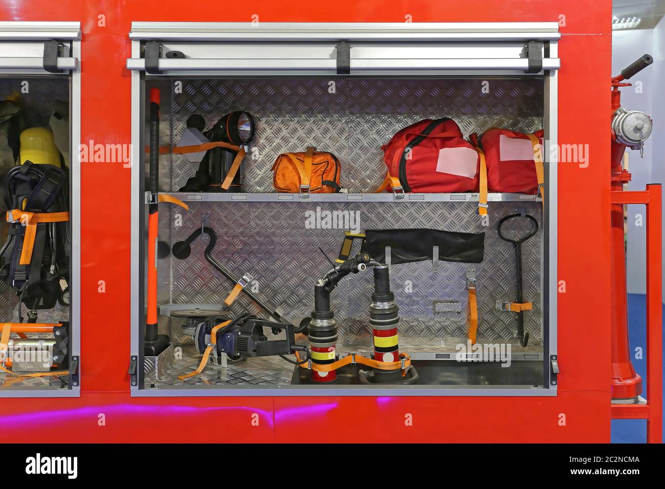 Tools and Equipment in Fire Engine Truck Cabinets Stock Photo - Alamy