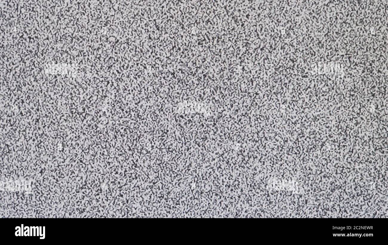 TV screen no signal, static noise and TV static fill the screen. UltraHD stock footage Stock Photo