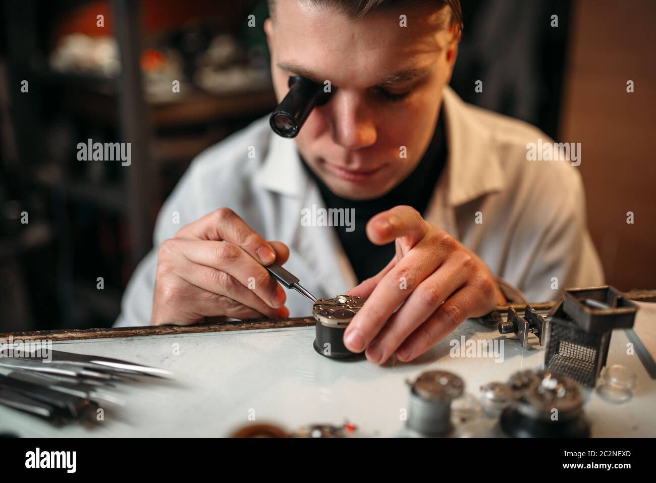 Clock maker repair old clockwork gear. Mechanical watches repairing