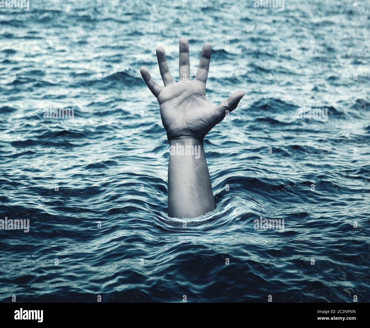 Hand of drowning man in sea asking for help Stock Photo Alamy