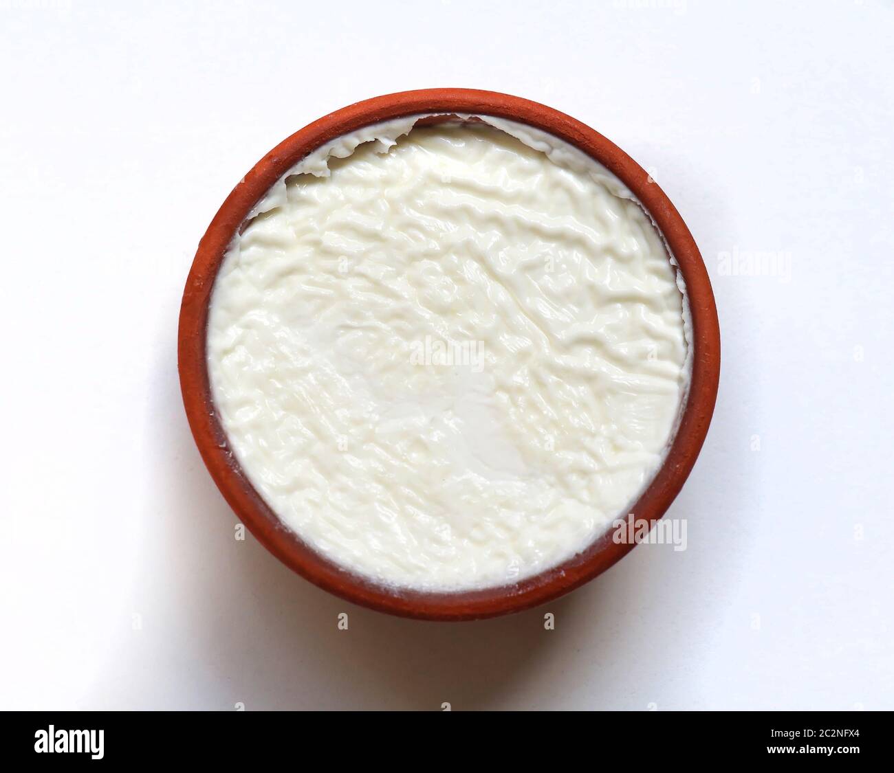 Traditional Greek style yogurt in a jar on white background Stock Photo