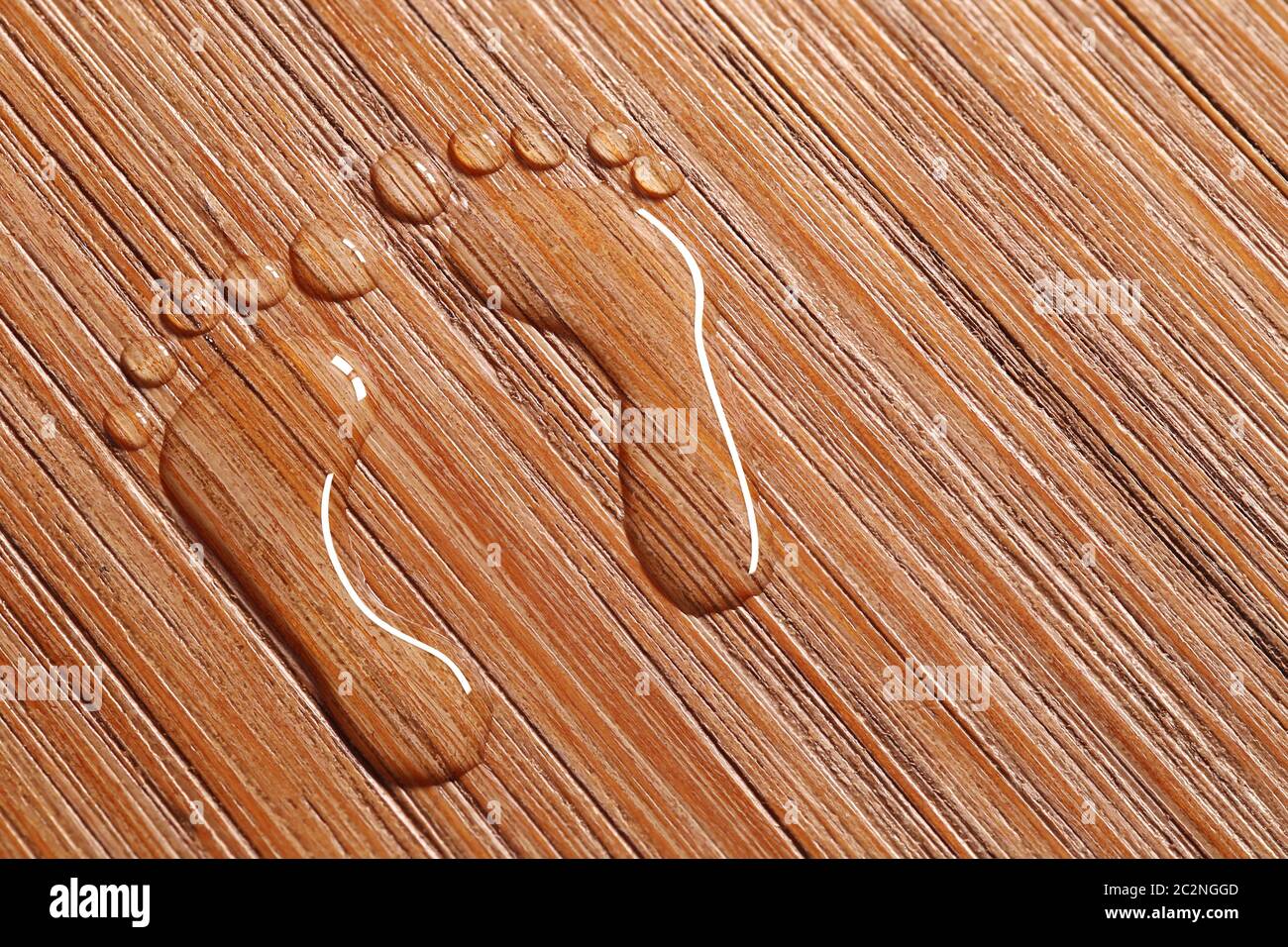 Symbol of two footprints on wood Stock Photo