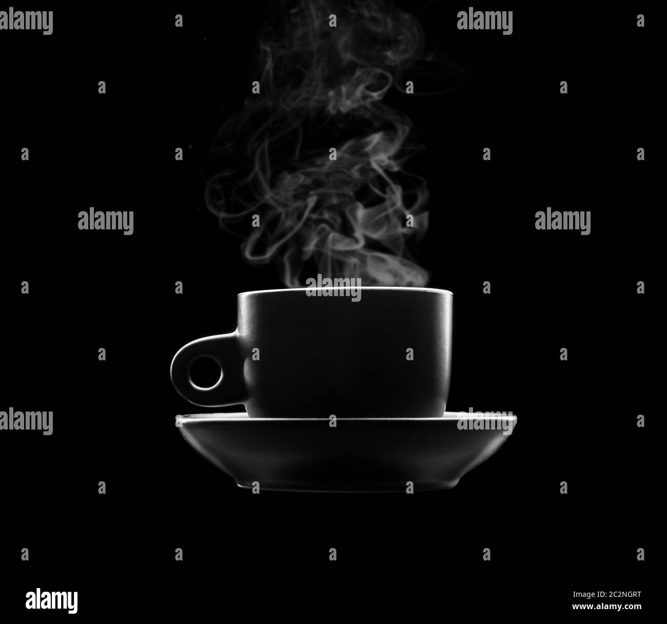 Cup of hot beverage isolated on black background Stock Photo Alamy