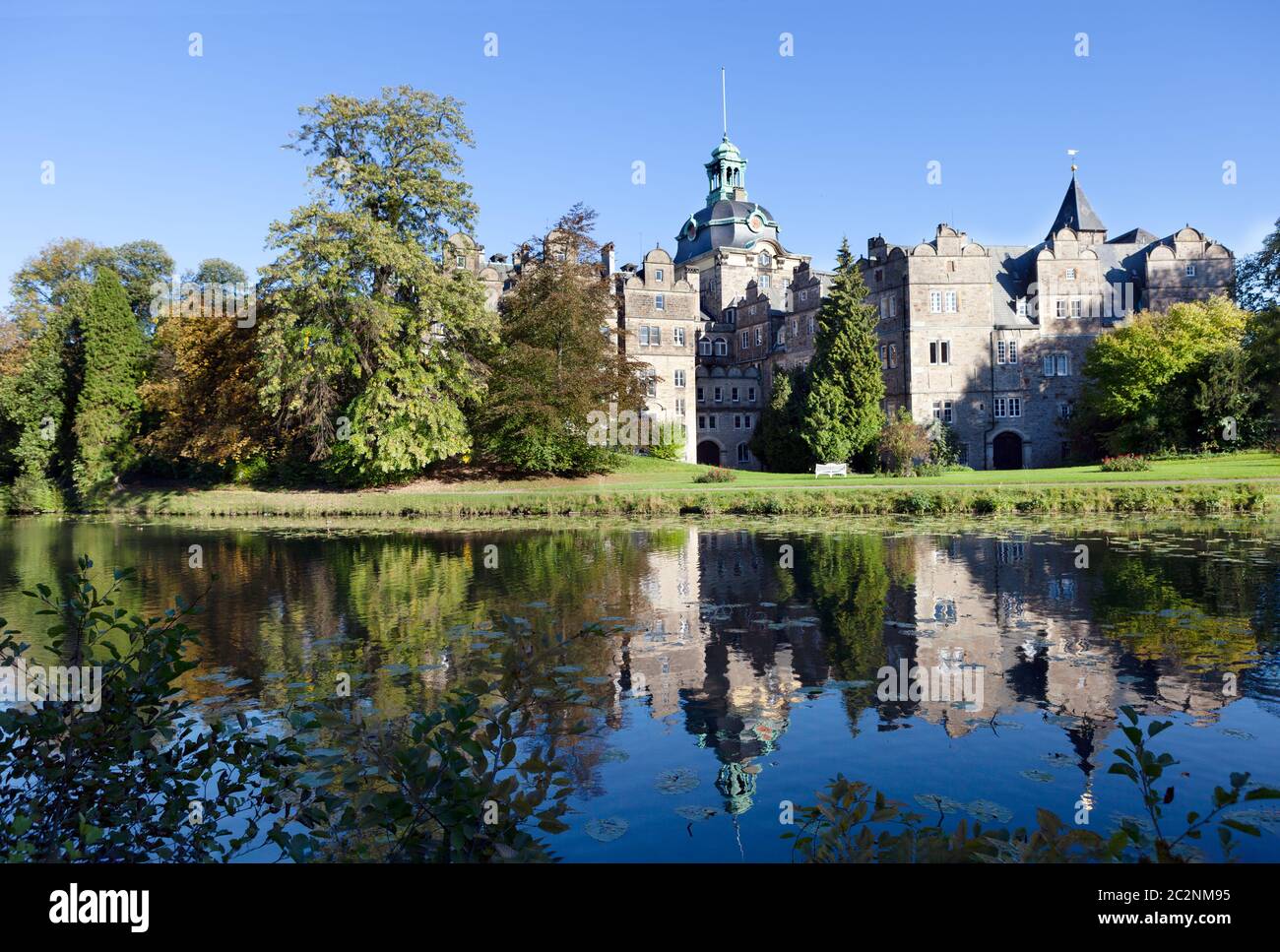 Castle Bueckeburg reflecting in the moat. Germany Stock Photo