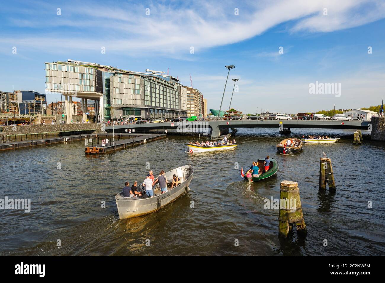 Sightseeng in front of DoubleTree Hilton hotel, around the Central Station of Amsterdam Stock Photo