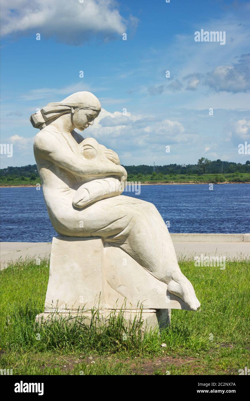 Statue of mother and baby Stock Photo