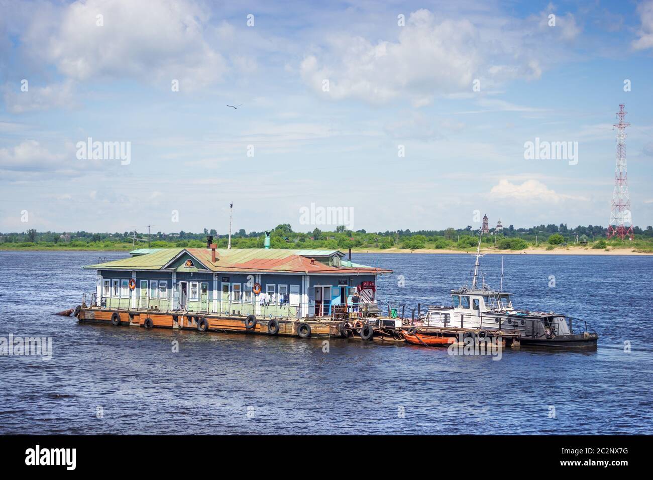 Old landing-stage at anchor on Volga Stock Photo