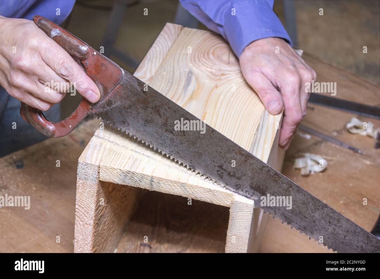 Work on the manufacture of the birdhouse Stock Photo
