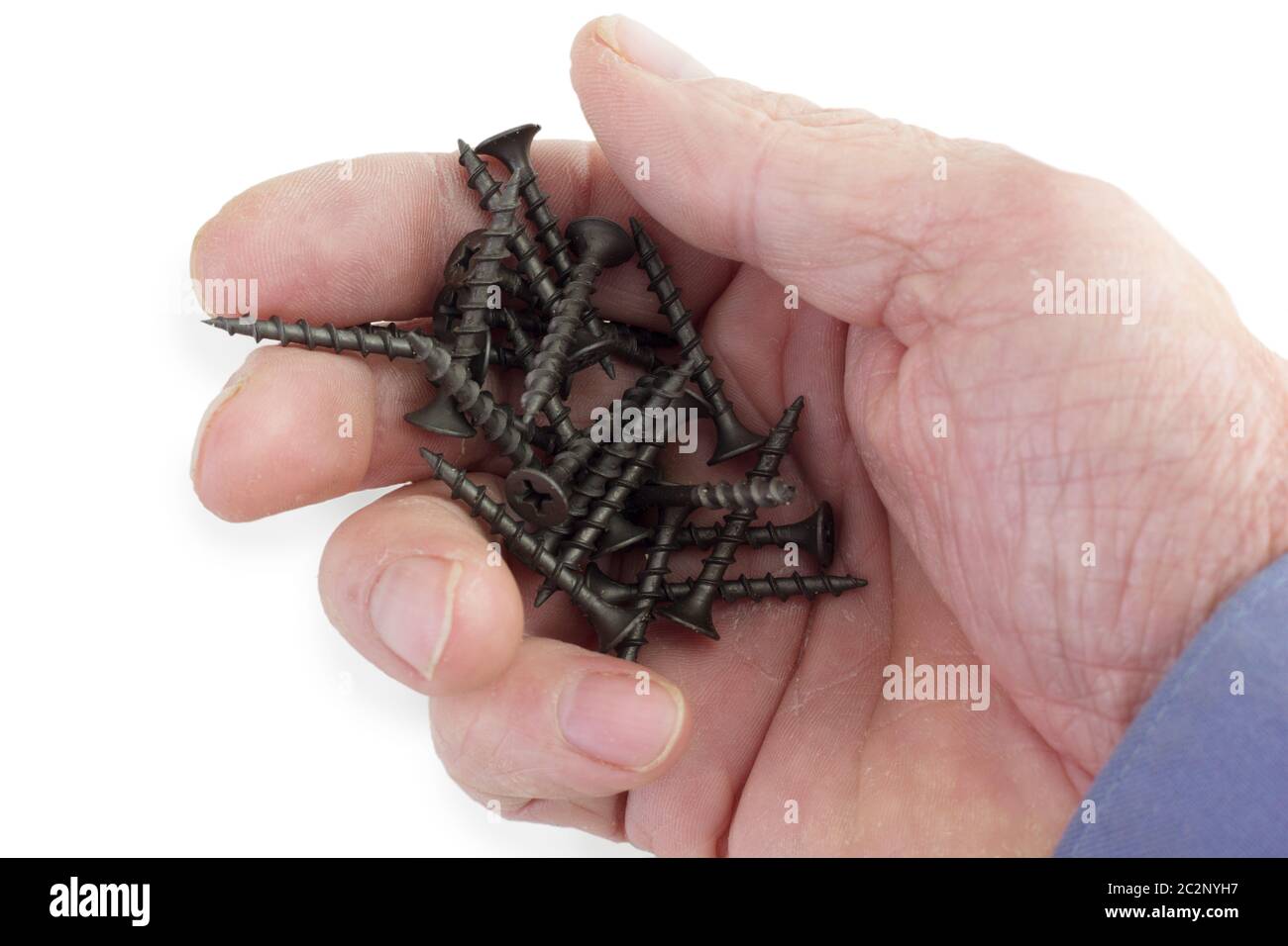 Handful  self-tapping screws on palm a white background Stock Photo