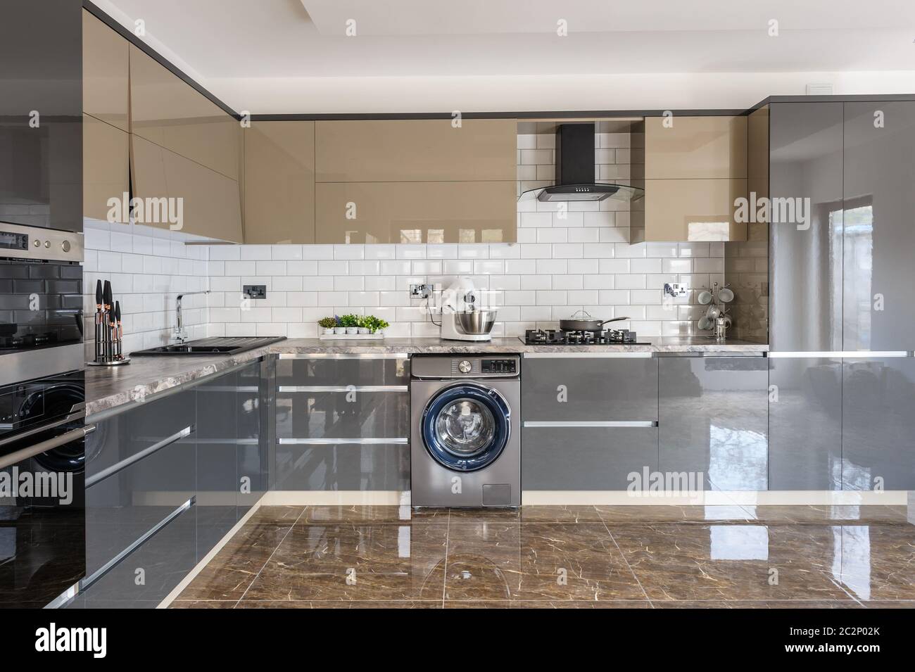 Luxury modern white, beige and grey kitchen interior Stock Photo