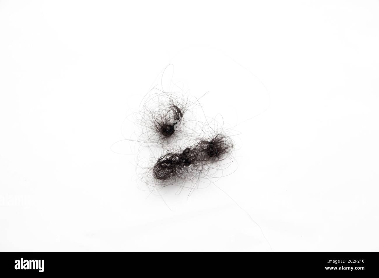 fallen hair with isolated white background Stock Photo