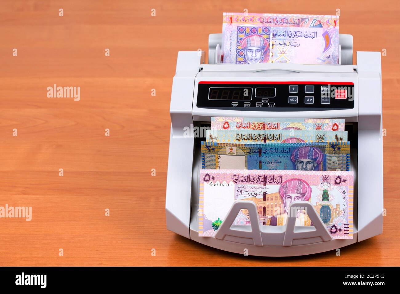 Money from Oman Rial in the counting machine Stock Photo Alamy