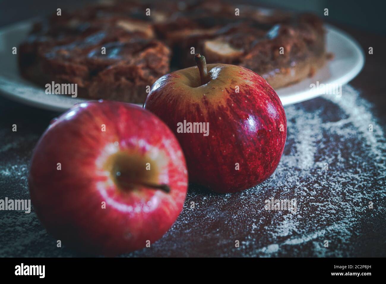 Fresh apples for baking home made apple cake shot in vintage dark and moody theme Stock Photo