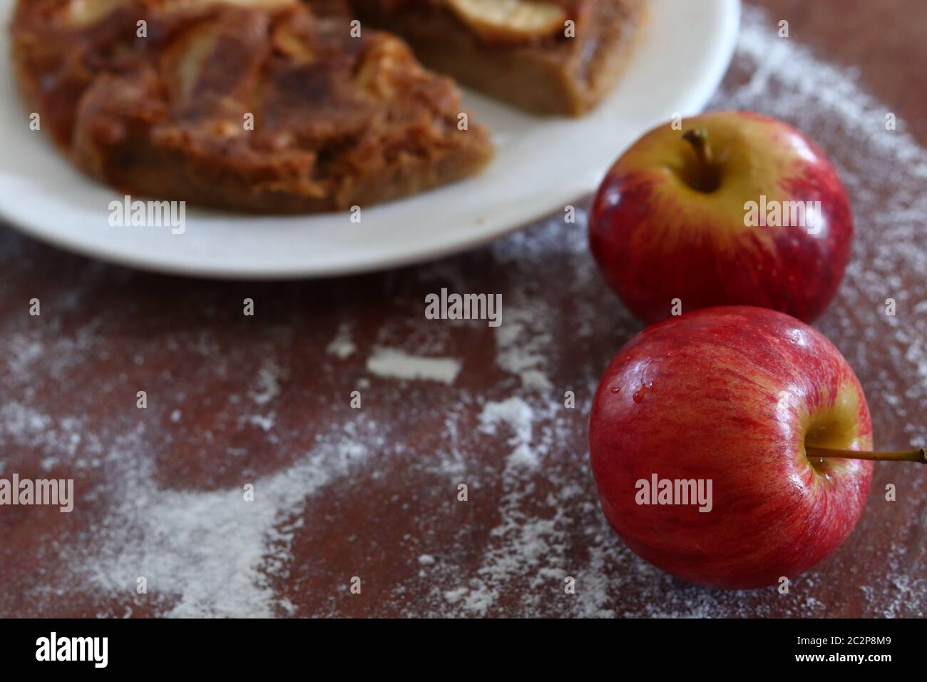 Fresh apples for baking home made apple cake shot in vintage dark and moody theme Stock Photo