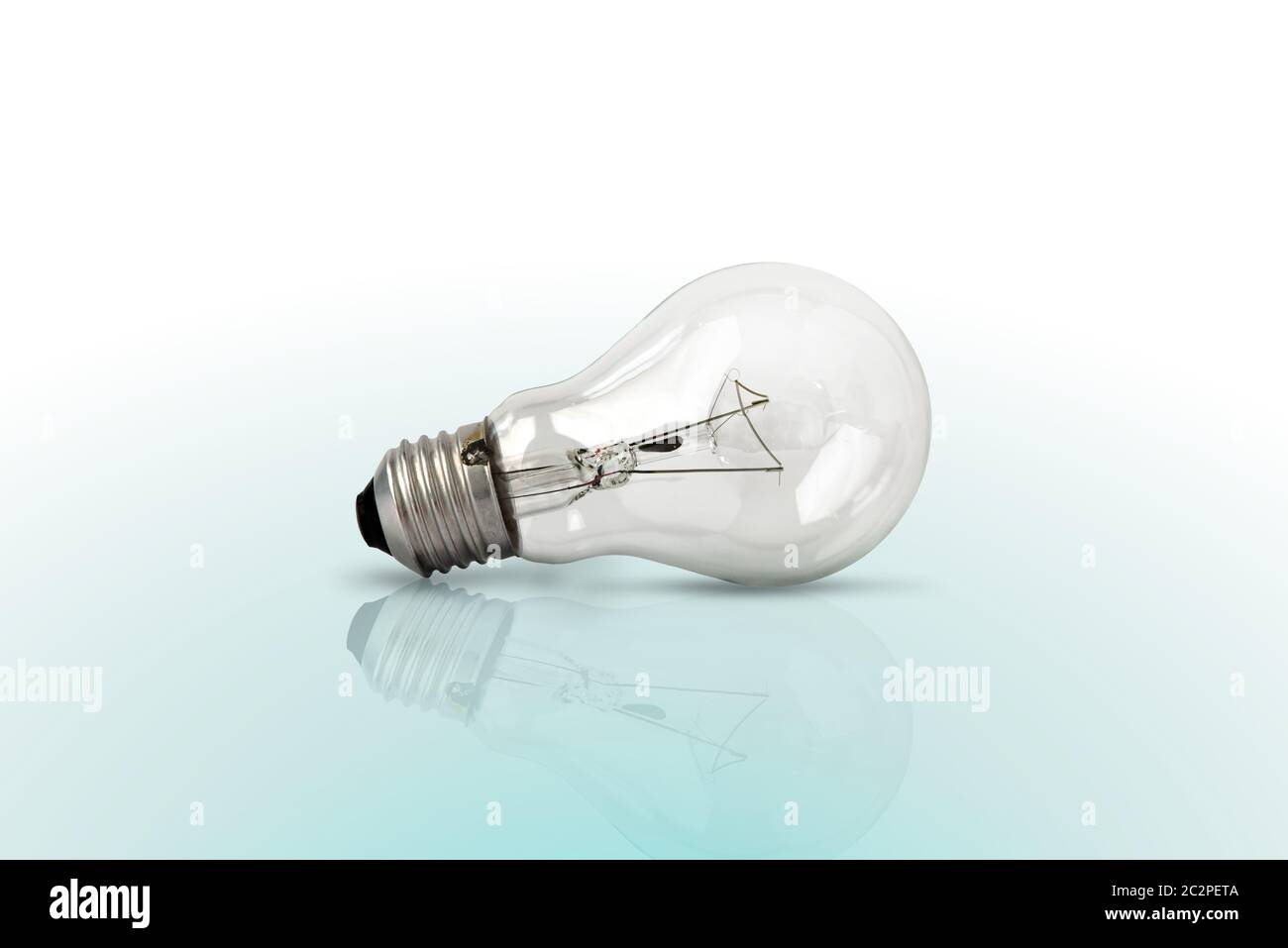 Light bulbs on blue color background. Flat lay. Pattern. Stock Photo