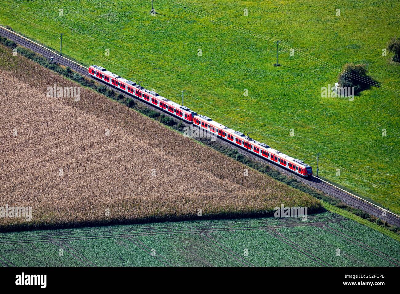 S-Bahn train on its track outside Munich Stock Photo