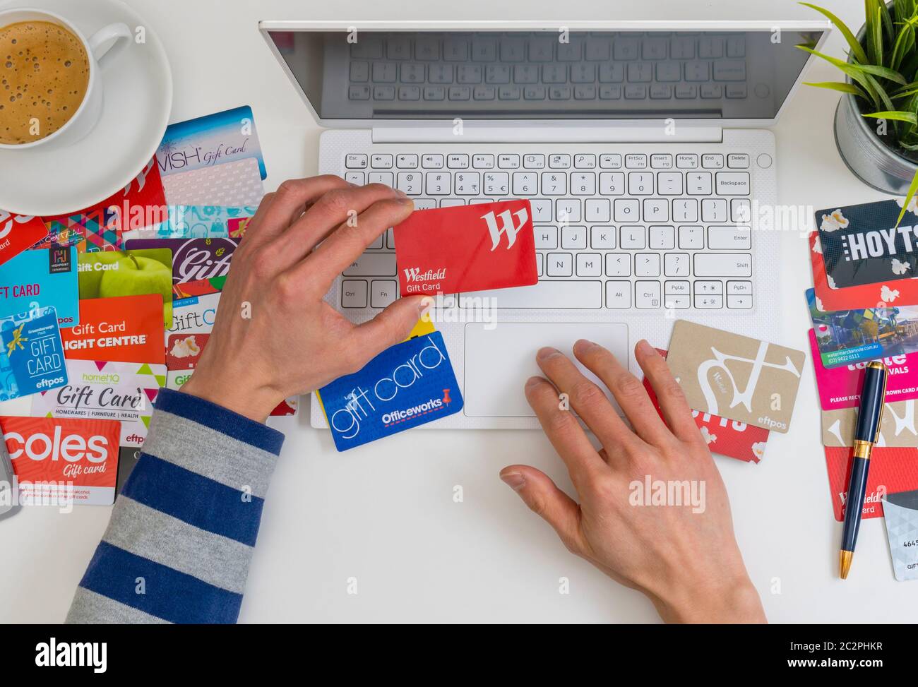 Top down view of online shopping using gift cards Stock Photo