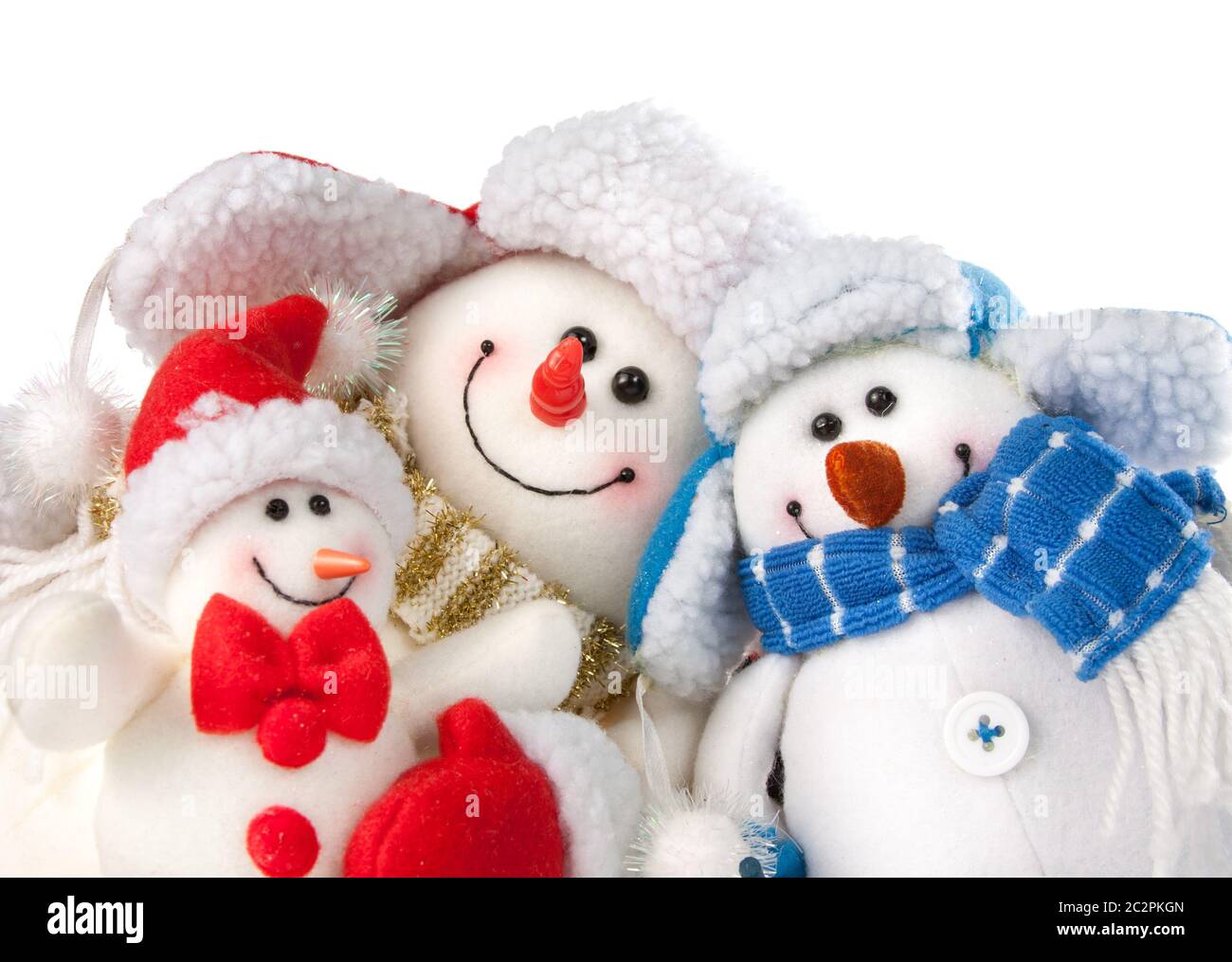 Three christmas snowmen isolated on white background Stock Photo - Alamy
