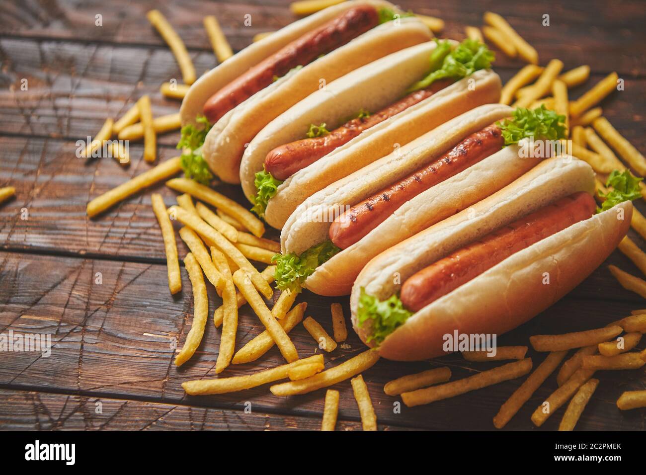 American hot dogs assorted in row. Served with french fries Stock Photo