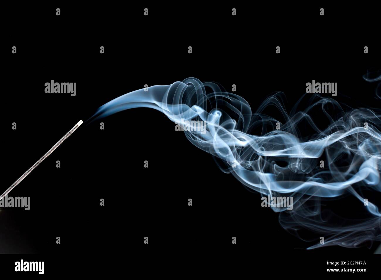 Abstract blue smoke waves from aroma stick Stock Photo - Alamy