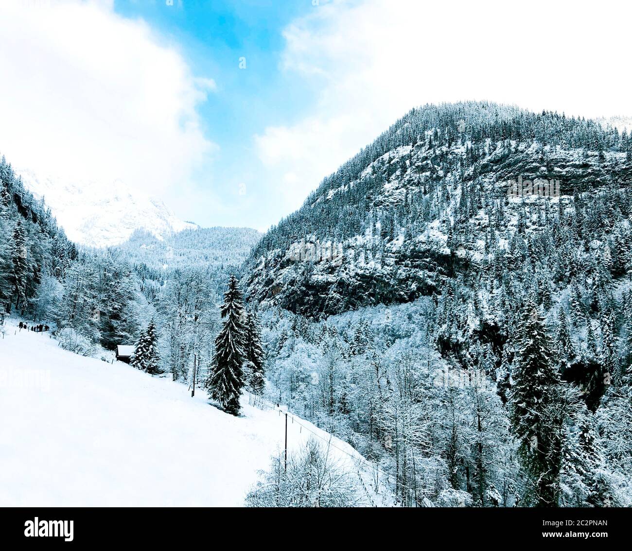 Hallstatt dreamscape winter snow mountain landscape outdoor adventure with blue sky in snowy day, Austria Stock Photo