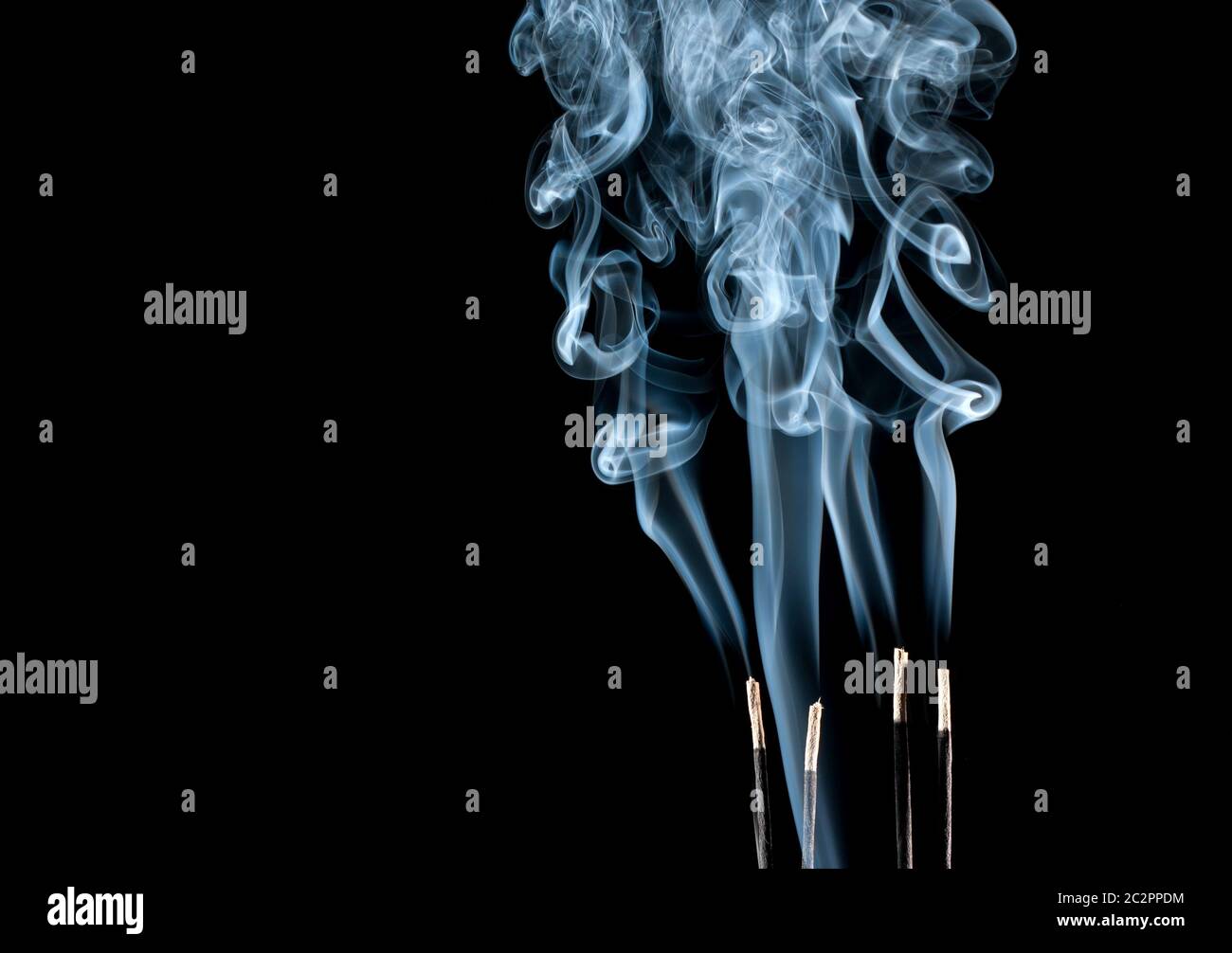 Abstract blue smoke waves from aroma sticks Stock Photo - Alamy