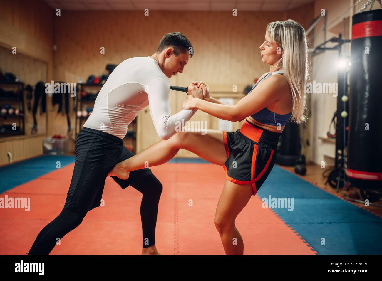 Female Fighter Hiding From A Knife Strike On Self Defense Workout With Male Personal Trainer Gym Interior On Background Woman On Training Self Defe Stock Photo Alamy Female Fighter Hiding From A Knife Strike On Self Defense Workout With Male Personal Trainer Gym Interior On Background Woman On Training Self Defe Stock Photo Alamy