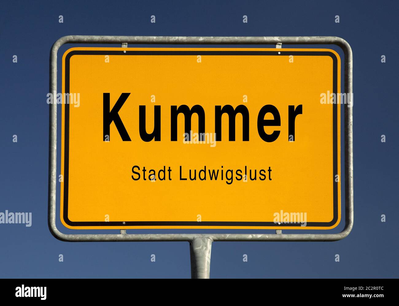 City limits sign of Kummer, district of the city Ludwigslust, Mecklenburg-Western Pomerania, Germany Stock Photo