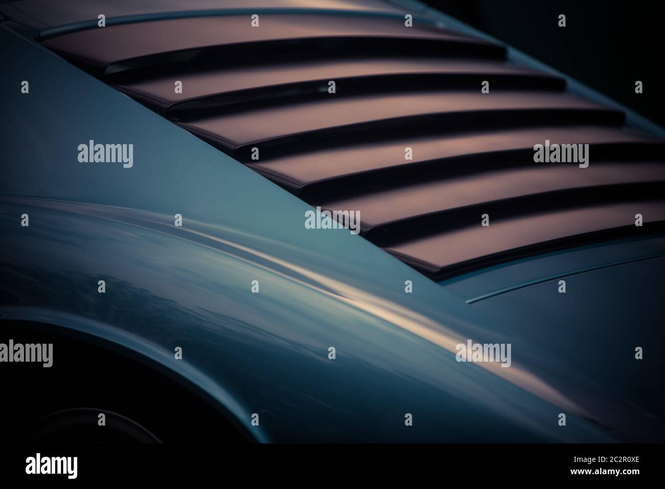 Close up shot of the rear window plastic shades of a classic vintage car Stock Photo Alamy